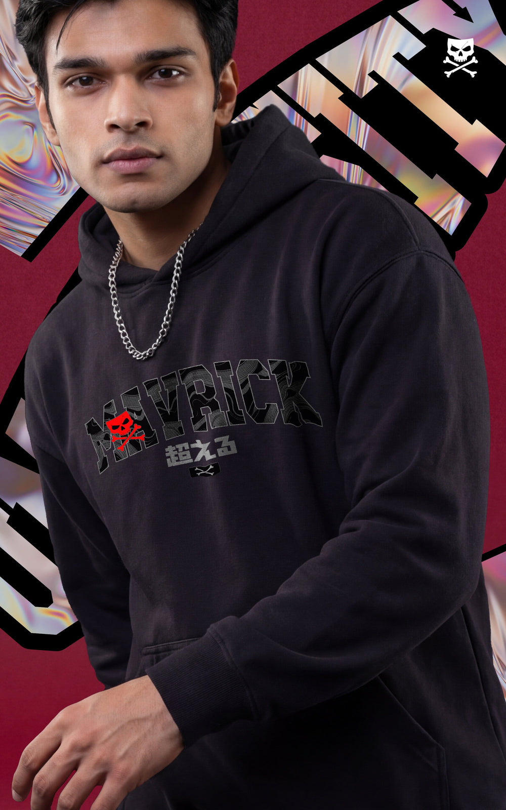 Front view of a male model in a black Mavrick graphic hoodie featuring Japanese characters and a silver chain, showcasing an urban streetwear look.