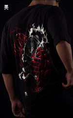 Side-angled view of a drop-shoulder black tee featuring Luffy in Gear 4 Bounceman with red Haki energy and steam effects.