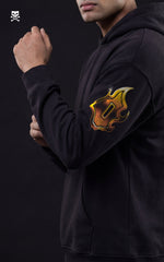 Side profile of a black Mavrick anime hoodie showcasing a detailed sleeve graphic of Rengoku’s signature flame-patterned katana guard and vertical typography.