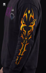 Side profile of a black Mavrick anime hoodie showcasing a detailed sleeve graphic of a cursed object (Sukuna’s finger) and vertical typography.