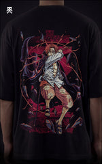 Closeup view of a male model wearing a boxy black oversized shirt featuring a crimson Haki graphic of Red-Haired Shanks with his sword drawn.