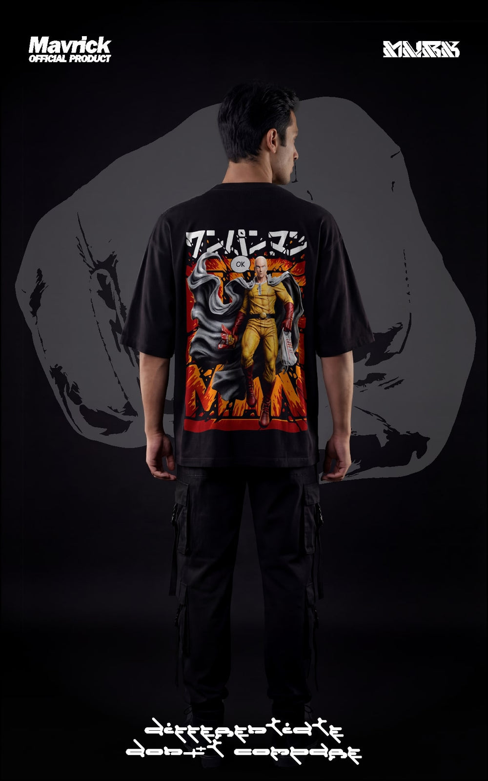 Back view of a male model in a black oversized shirt featuring a "Serious Series" Saitama graphic with an orange explosive background.