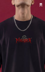 Front view of a male model looking upward, wearing a black oversized t-shirt with a "MAVERICK" logo and a silver chain necklace. The background features dark red "DEATH SAMURAI" text in a sharp, metallic font with liquid blood splashes.												