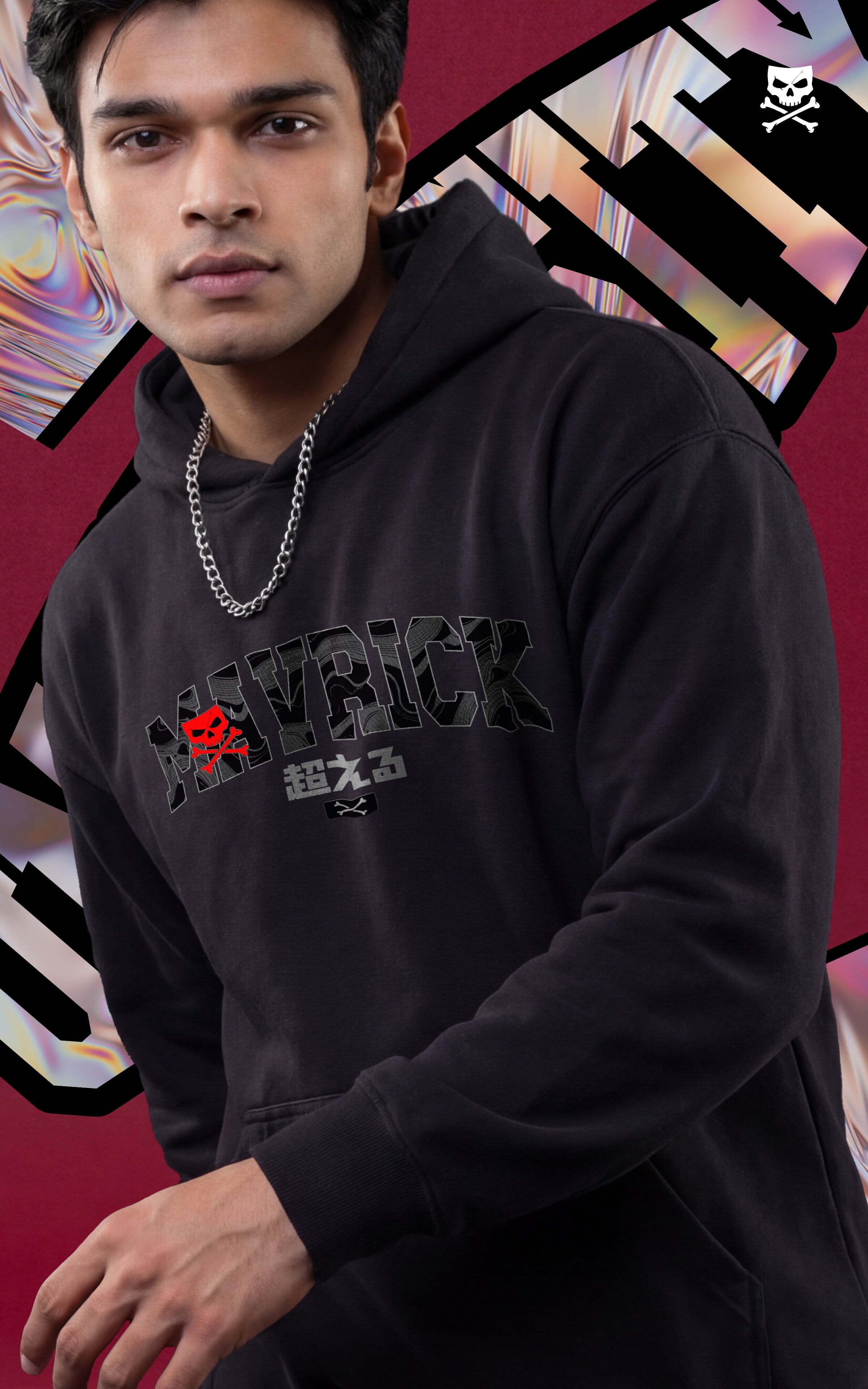 Front view of a male model in a black Mavrick graphic hoodie featuring Japanese characters and a silver chain, showcasing an urban streetwear look.