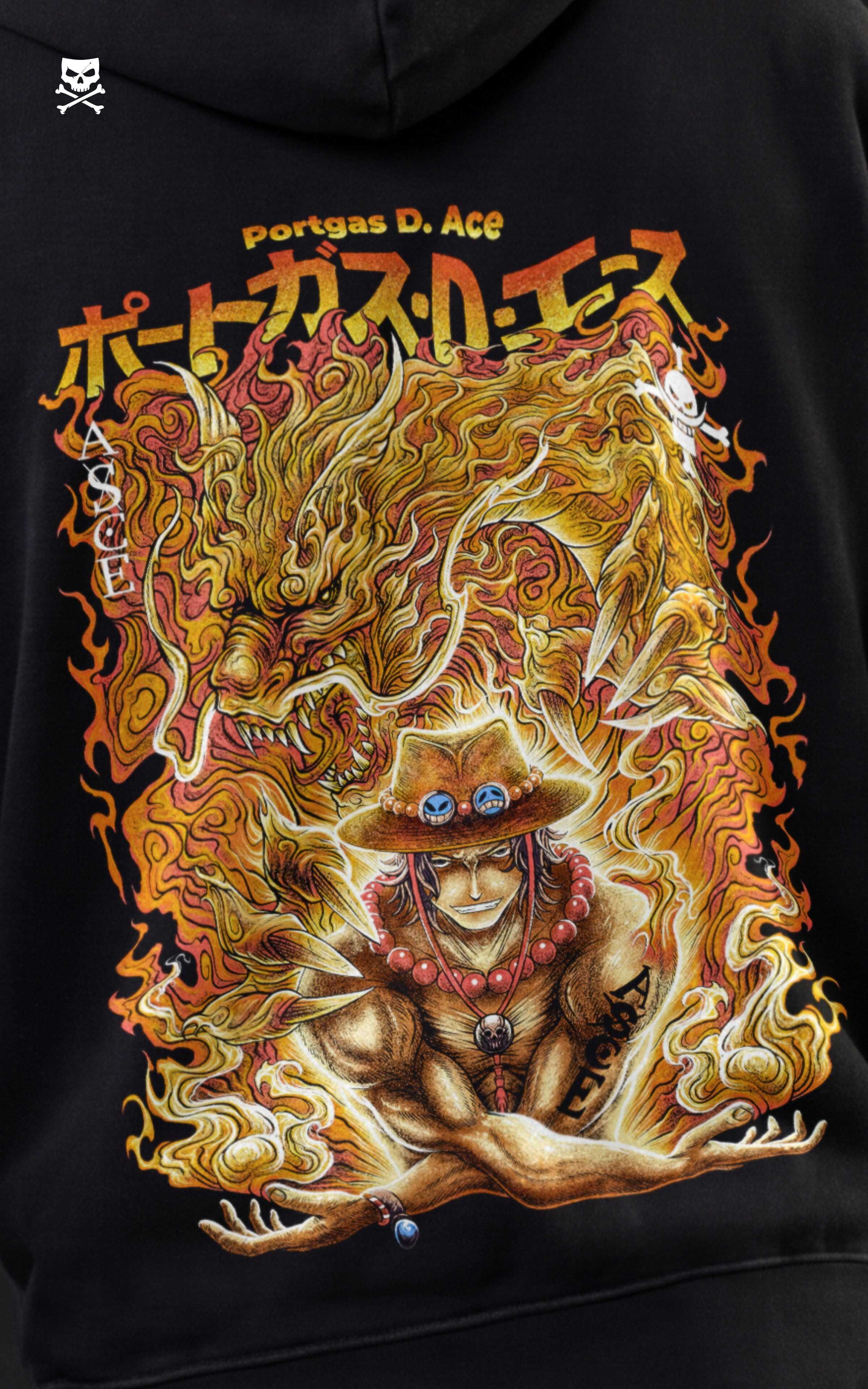High-detail close-up of the Portgas D. Ace "Fire Fist" back print, showing intricate gold and orange flame illustrations, a Japanese kanji logo, and a stylized dragon surrounding the anime character.