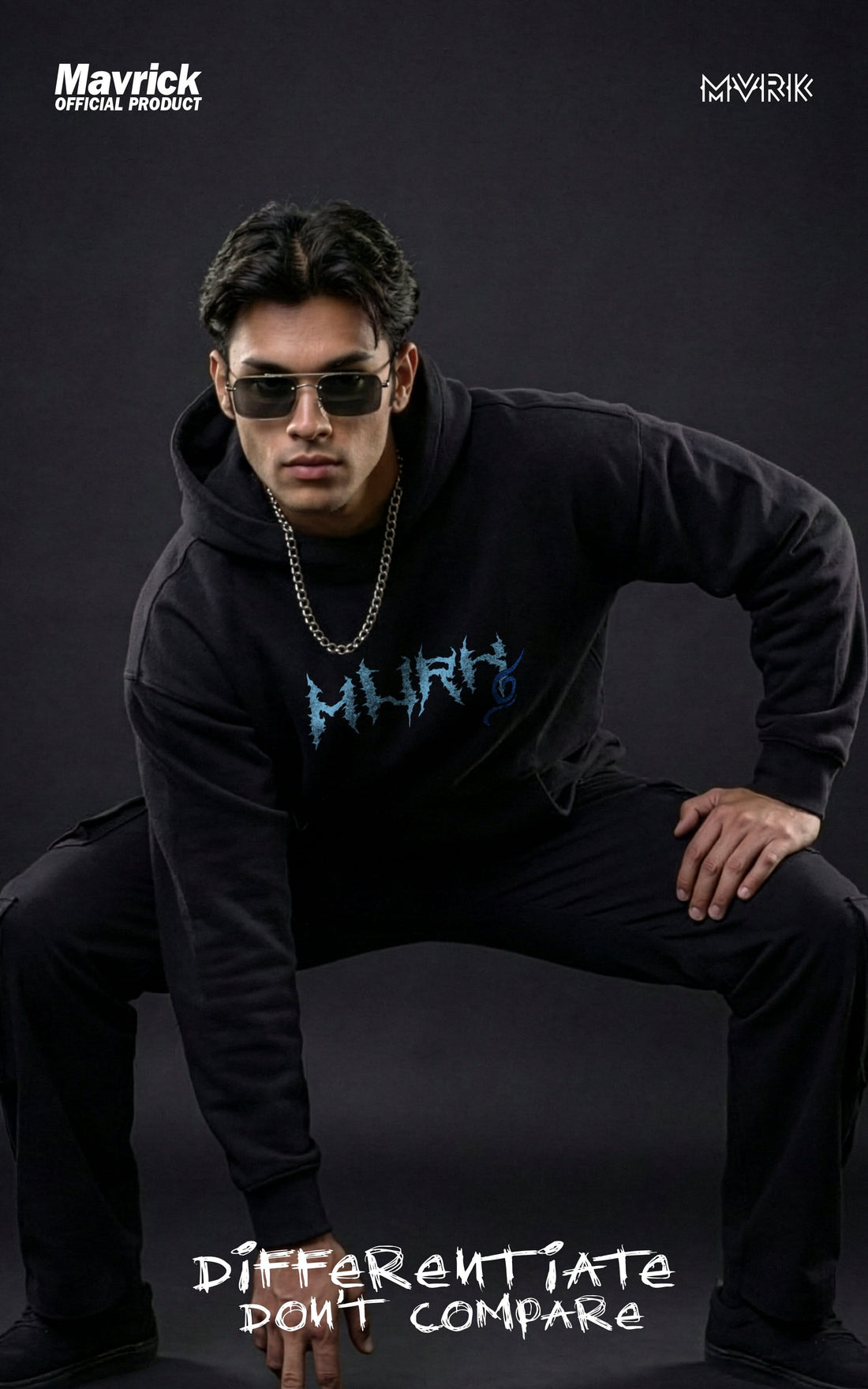 Front view of a model in a crouched pose wearing a Mavrick Kakashi Hatake hoodie with a blue lightning-style Chidori MVRK logo on the chest.