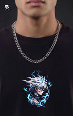Model wearing a silver chain and a black t-shirt with a chest graphic of an anime character profile and blue lightning strikes.