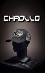 Profile view of a 5-panel Chrollo snapback with a curved brim, showcasing white spider embroidery on the side and premium textured 