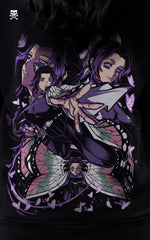 High-resolution close-up of the back graphic on a Mavrick hoodie featuring Shinobu Kocho in various action poses surrounded by purple butterflies and floral patterns.