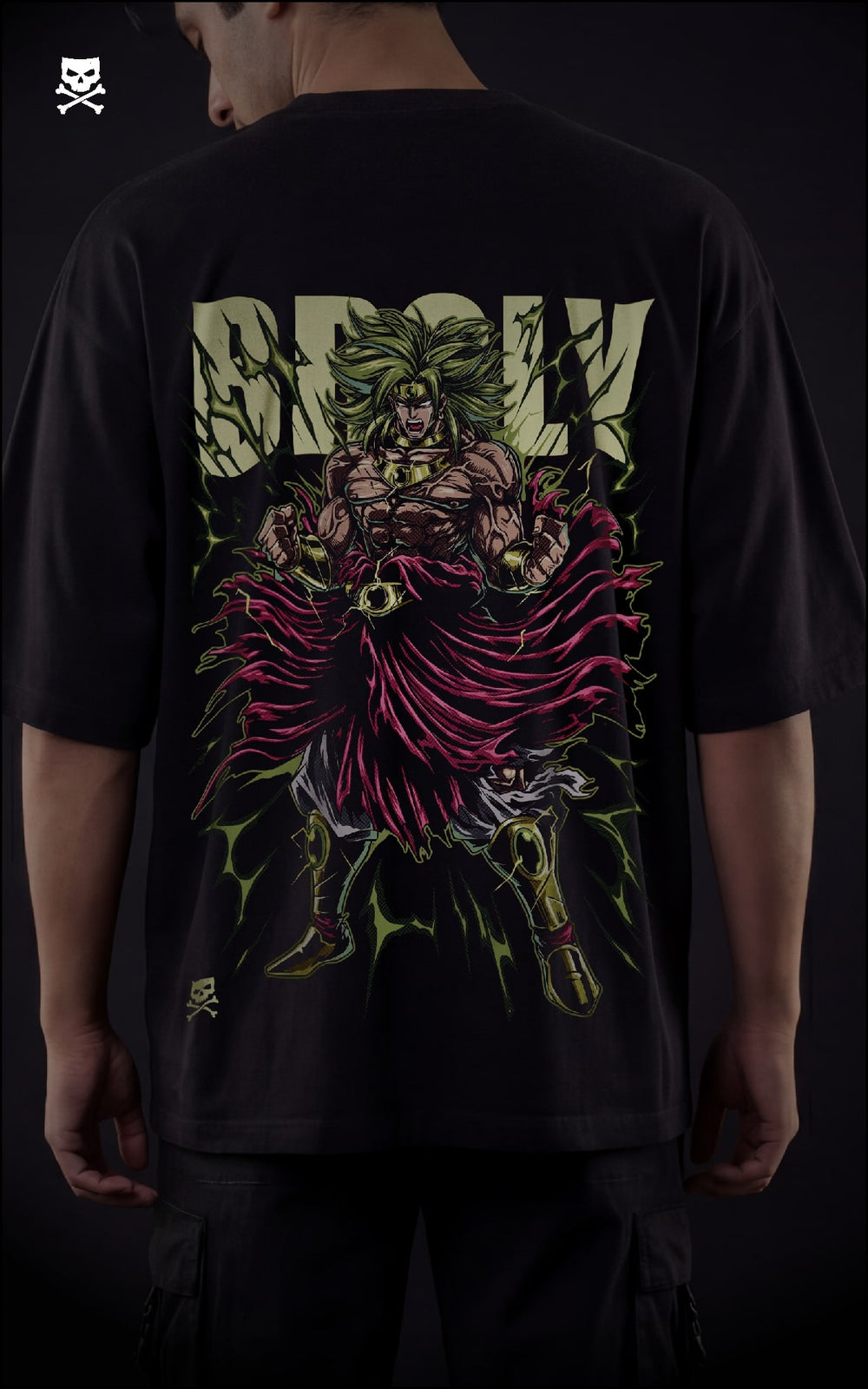 Closeup view of a male model in a drop-shoulder black shirt featuring a Legendary Super Saiyan Broly graphic with neon green energy bursts.
