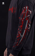 Side profile of a Mavrick streetwear hoodie showing a detailed sleeve graphic of a Katana wrapped in red spirit energy and falling cherry blossom petals.