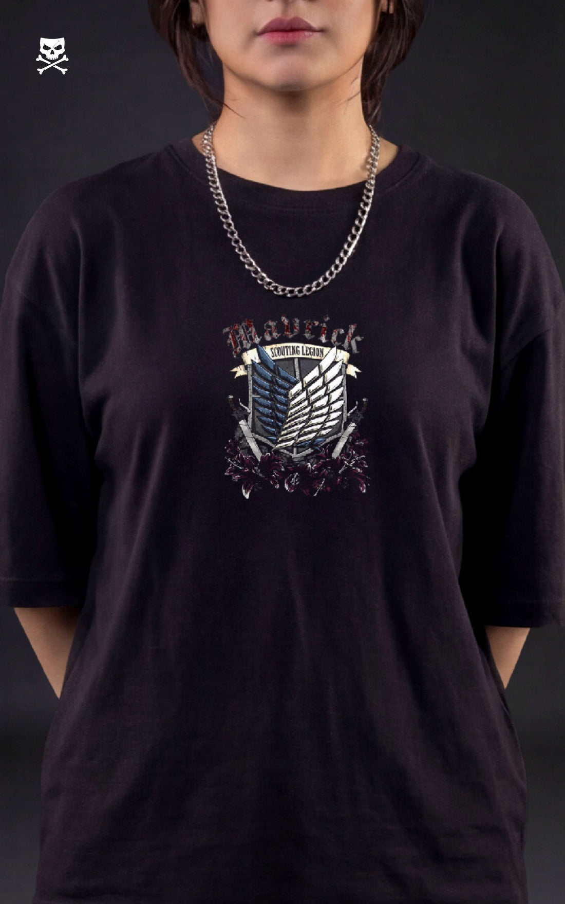 Back view of a female model wearing a boxy black tee with Mikasa Ackerman, her red scarf, and the Scout Regiment Wings of Freedom.