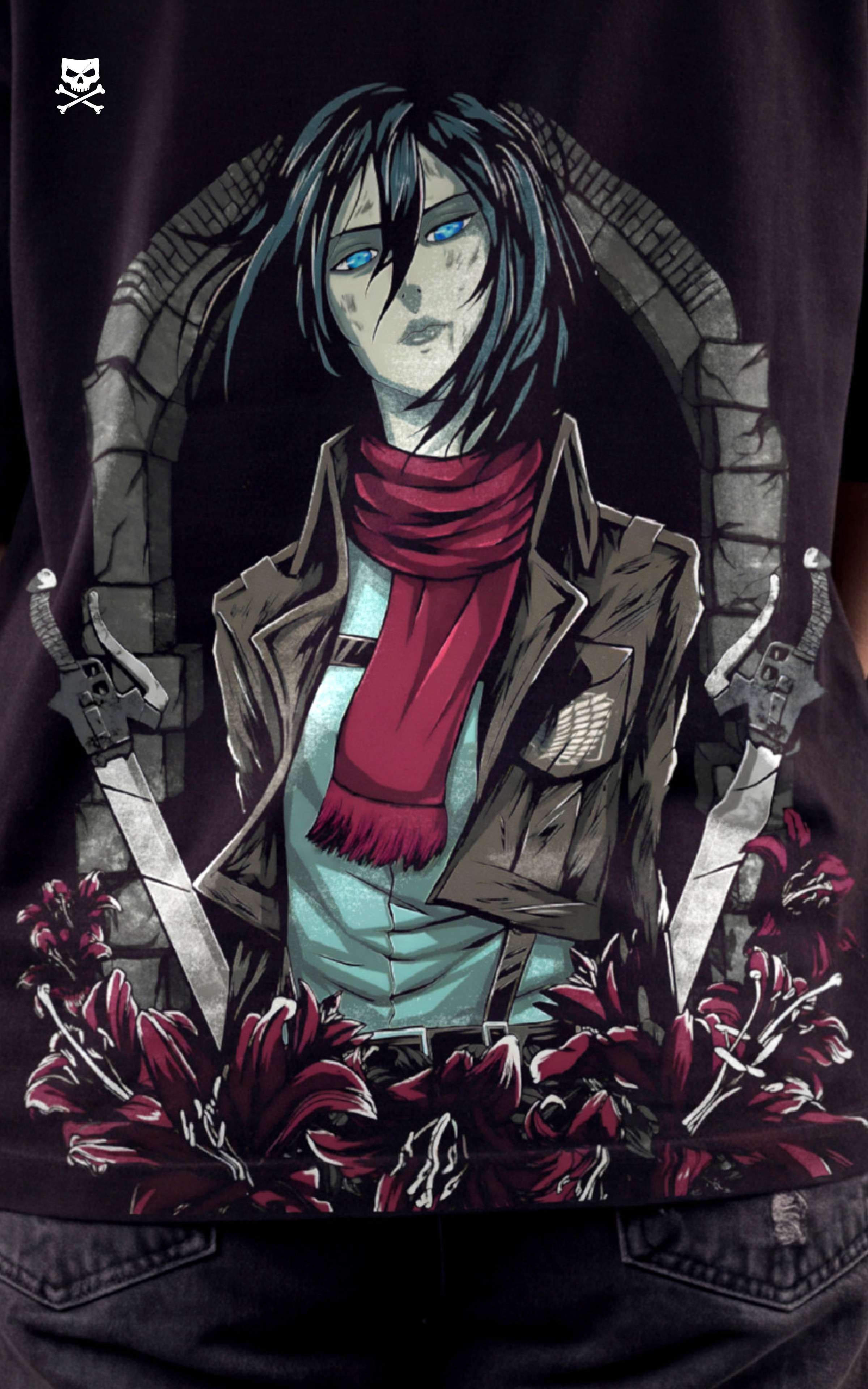 Closeup view of a female model wearing a boxy black tee with Mikasa Ackerman, her red scarf, and the Scout Regiment Wings of Freedom.