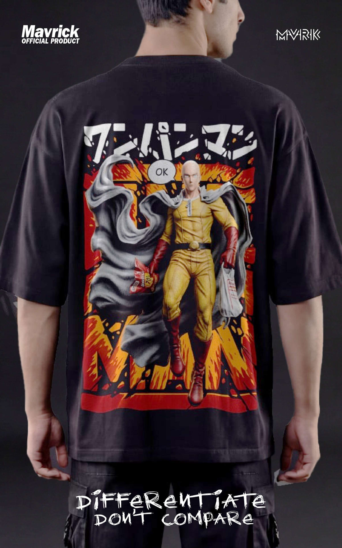 Back view of a male model in a black oversized shirt featuring a "Serious Series" Saitama graphic with an orange explosive background.