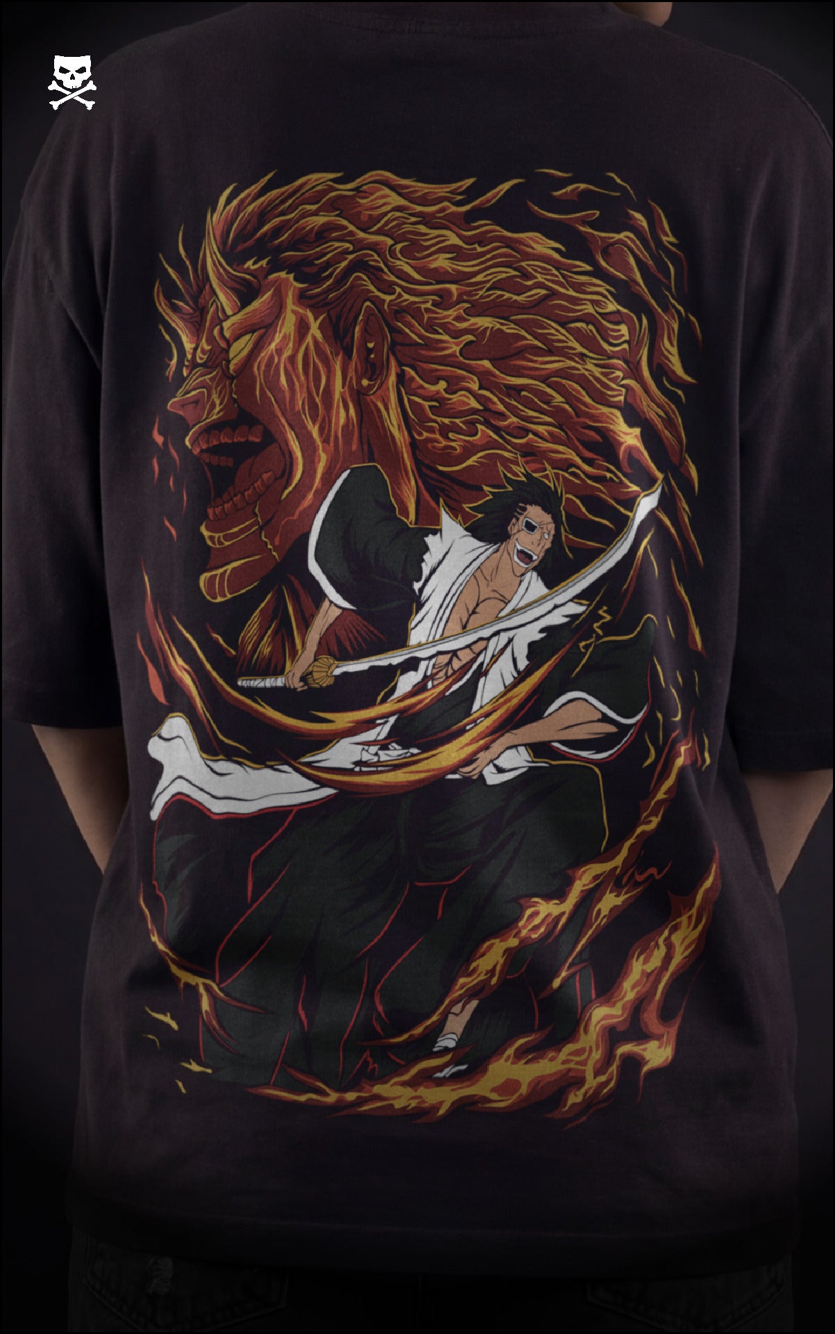 Closeup view of a female model in a heavyweight black t-shirt featuring a demonic Bankai graphic of Kenpachi Zaraki with orange spiritual energy.